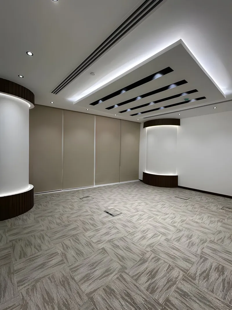 Finished corridor with gypsum partitions and decorative cladding