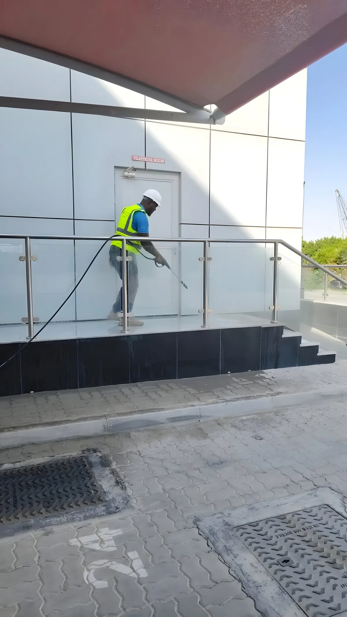 Worker on façade renovation works