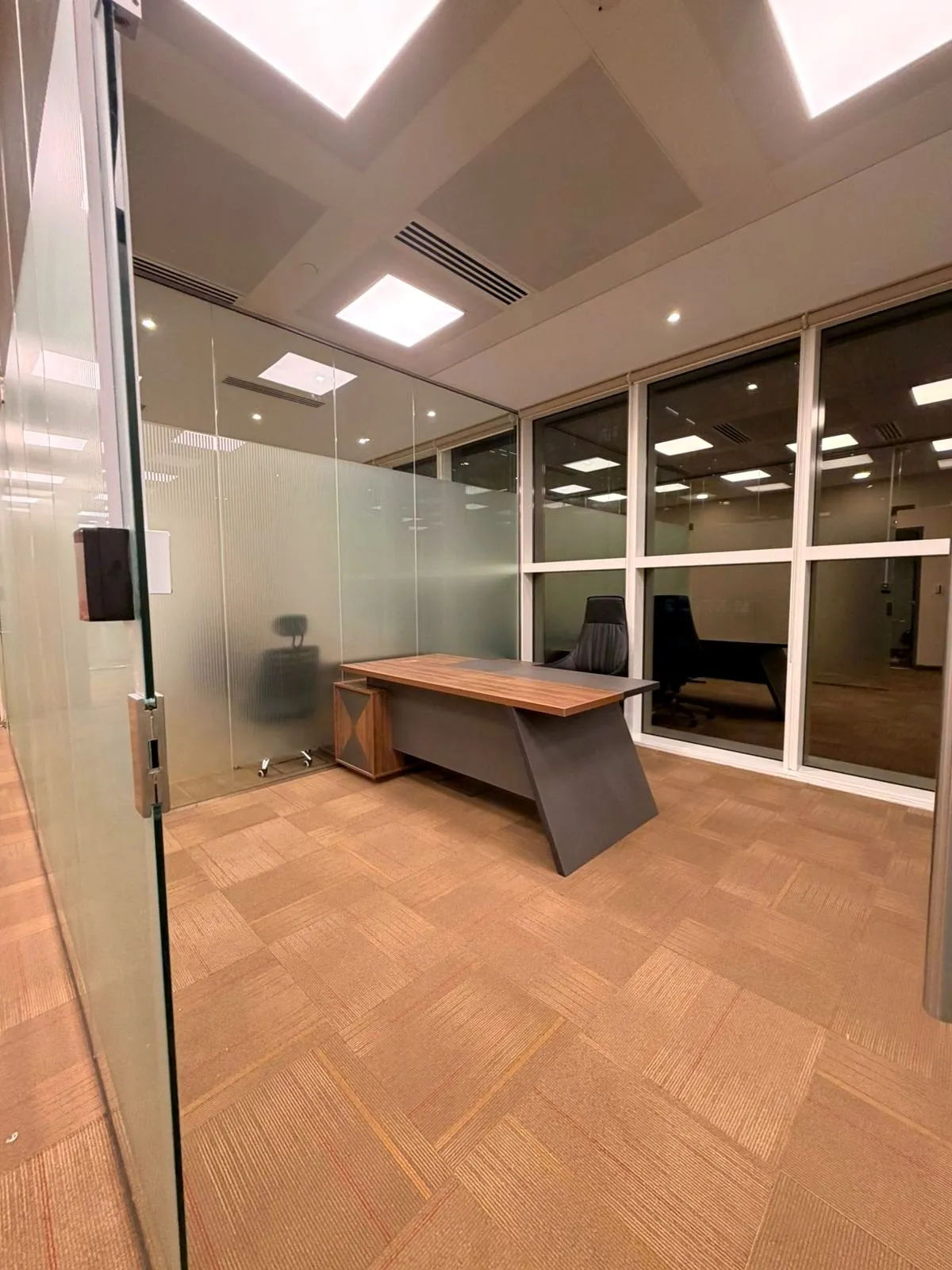 Glazed office after a multi-trade commercial fit-out